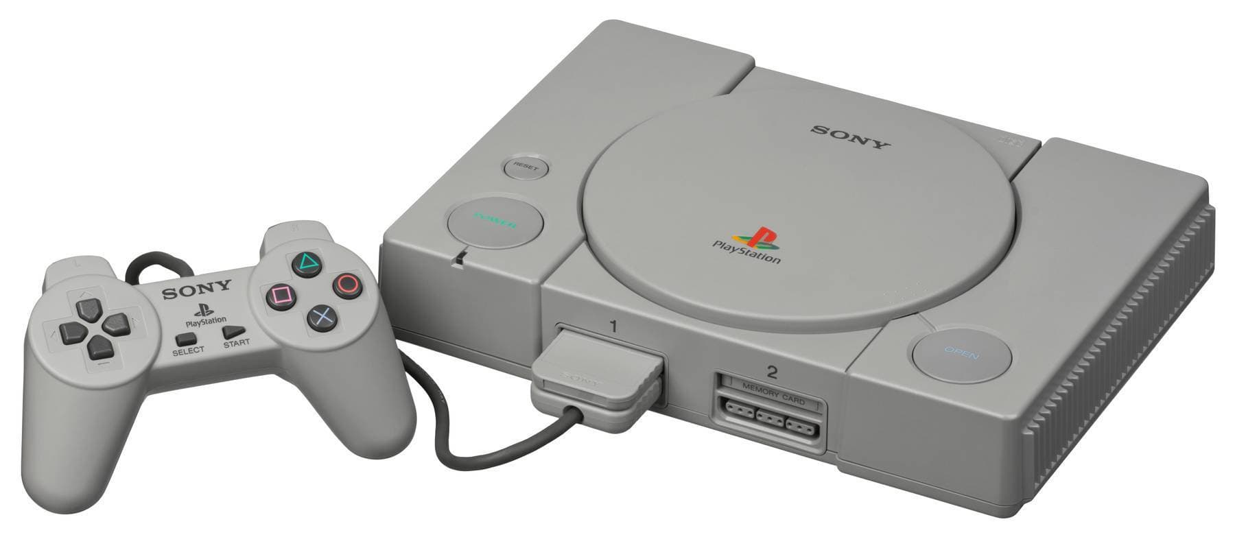 A Sony PlayStation video game console, shown with controller and memory card attached. This is a Japanese SCPH-1000, which was the very first model of PlayStation commercially released. It is similar to the American SCPH-1001 except it also features an S-Video out and comes bundled with the shown SCPH-1010 controller. The SCPH-1010 was a short-lived controller model and was only bundled with the SCPH-1000. It features shorter arms, a shorter cord and lacks a ferrite bead compared to the more common SCPH-1080.